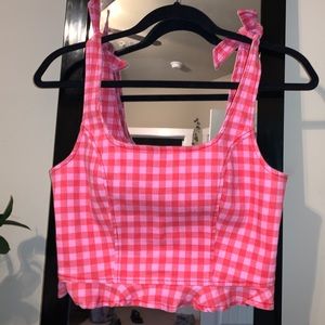 Crop tops and mini skirt.
